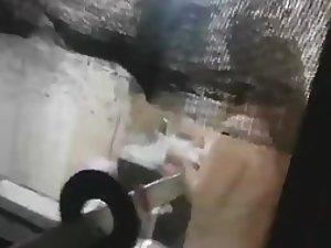 Peeping at a hot girl through a window