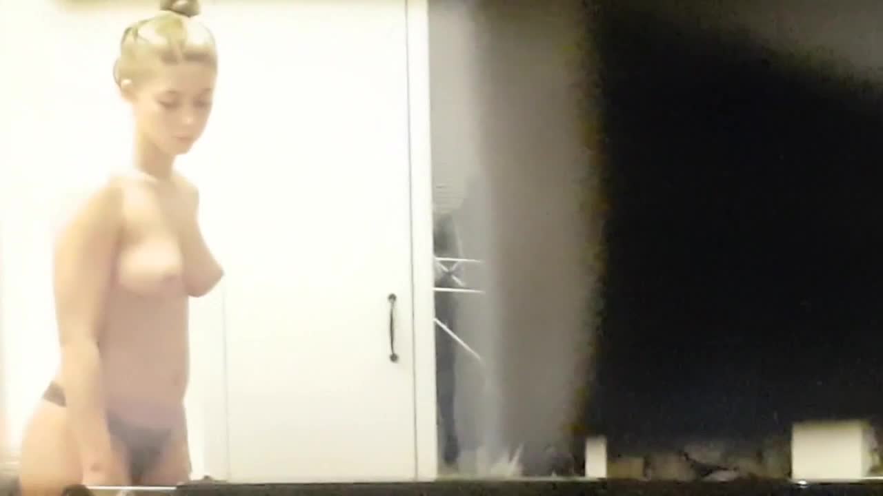 Peeping on almost naked sexy neighbor exercising pic