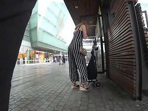 Hourglass body jiggling in jumpsuit with stripes Picture 3