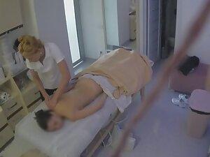 Spying on a hot woman during massage Picture 1