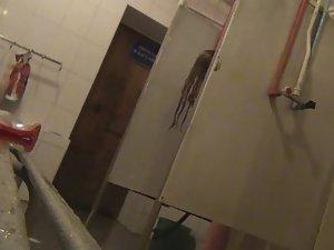 Tall girl scrubs herself in a shower Picture 8