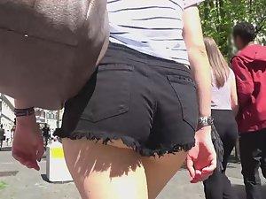 Phat ass in black cutoff shorts
