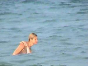Skinny girl rushing out of the water Picture 3