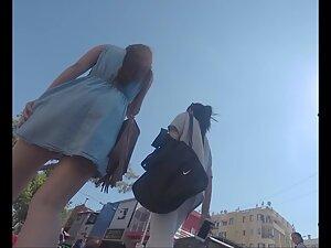 Upskirt caught before she started holding her dress because of wind Picture 2