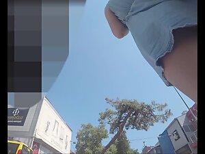 Upskirt caught before she started holding her dress because of wind Picture 7