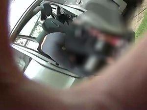 Spying my neighbor bending over in a car Picture 2