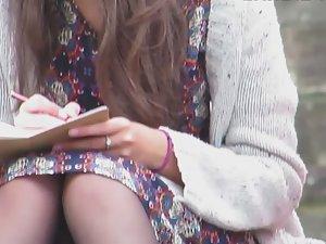 Upskirt of a beautiful bookworm Picture 4
