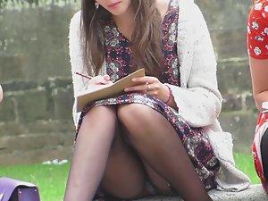 Upskirt of a beautiful bookworm Picture 5