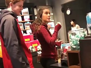 Gorgeous teen girl shopping with her boy
