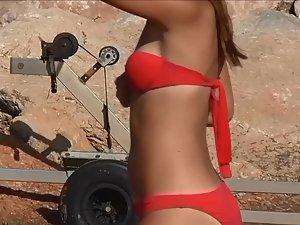 Hot teen playing and dancing on the beach Picture 1