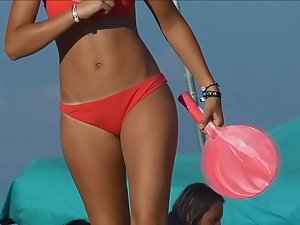 Hot teen playing and dancing on the beach